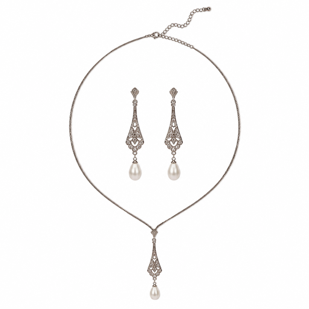 Pearl-drop earrings centred inside the necklace