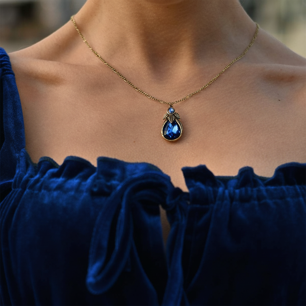 Sapphire blue dress with matching necklace