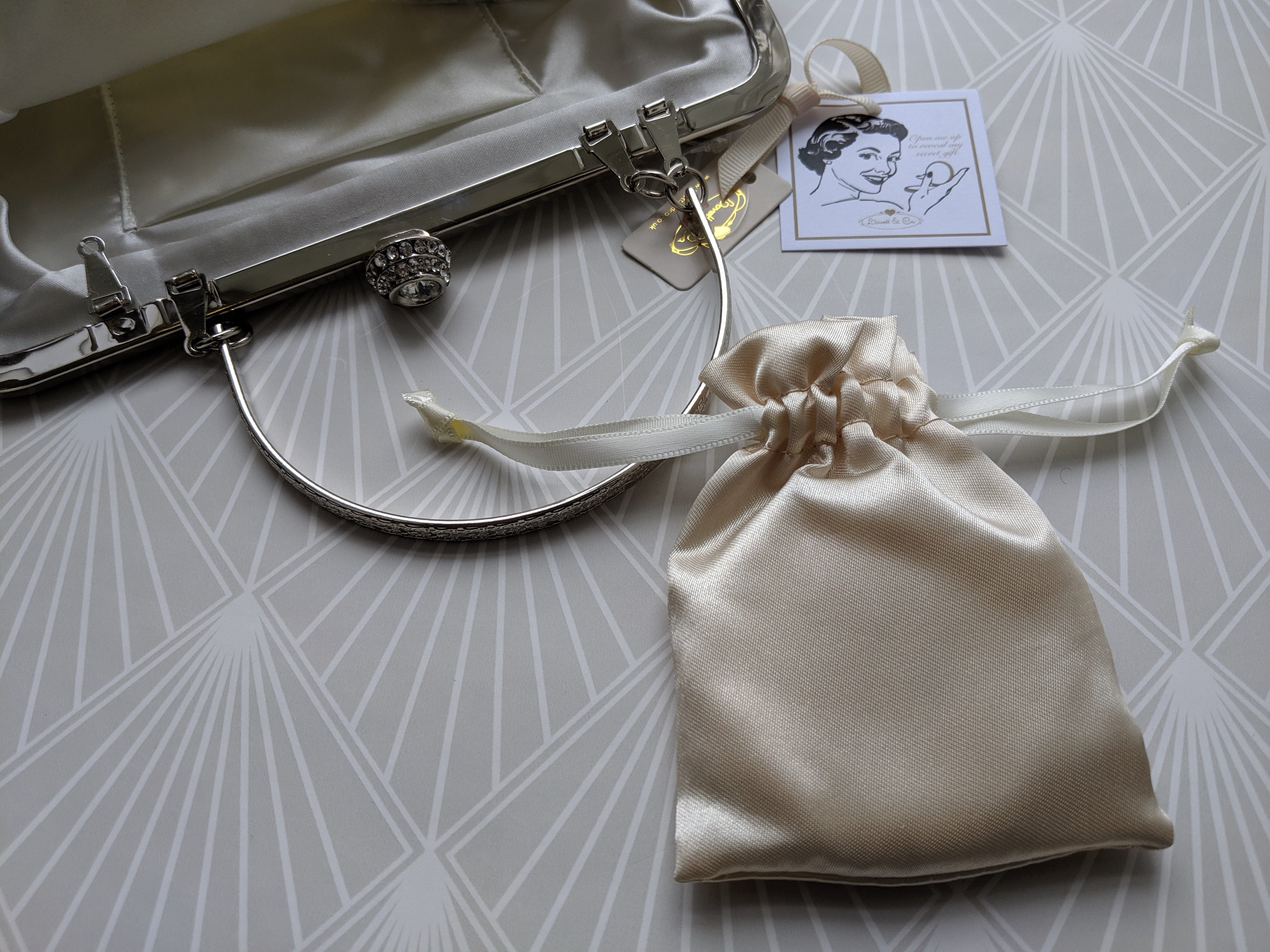 Feather Diamante Clasp Bag