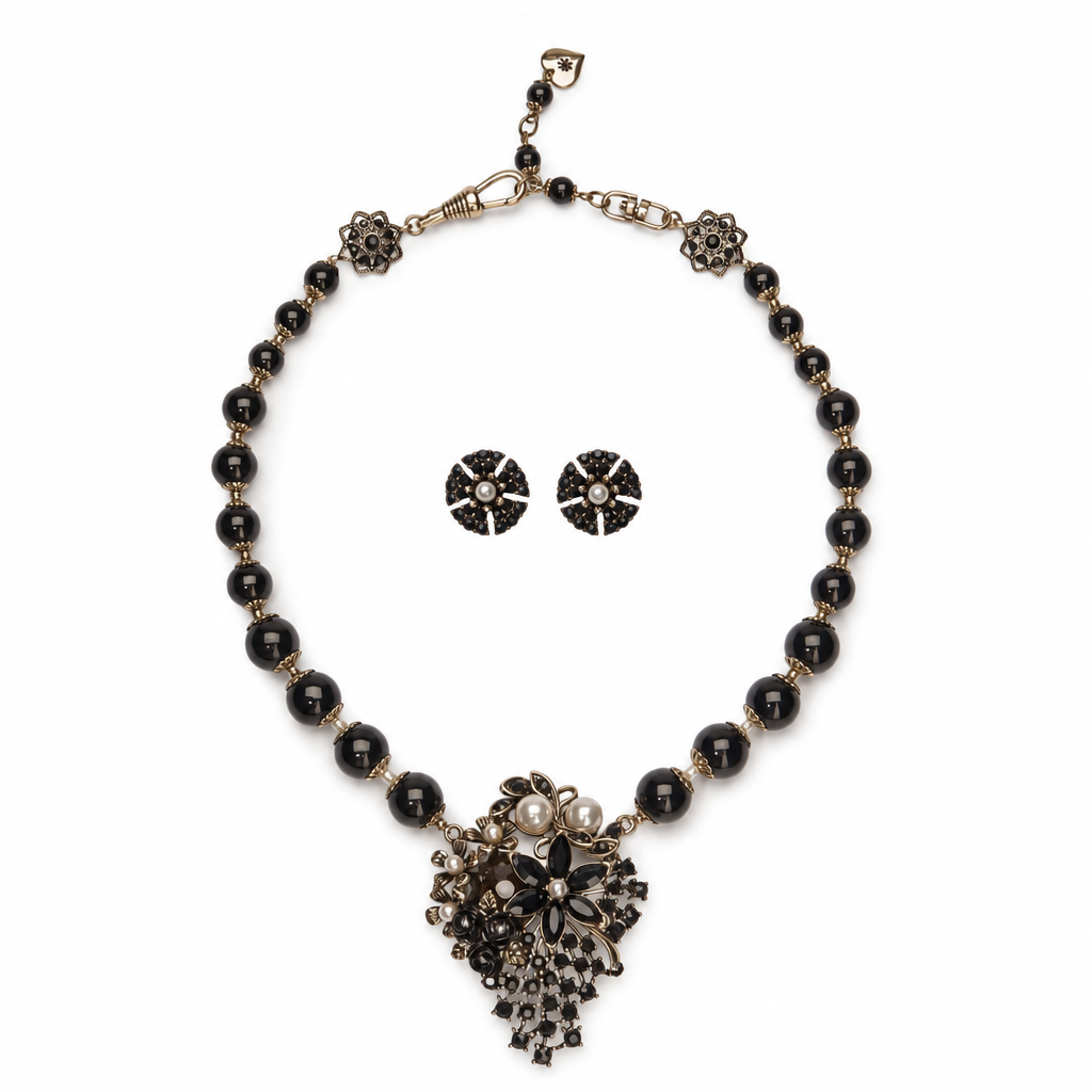 Necklace with stud earrings centred inside