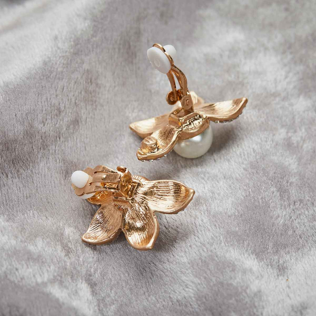 vintage inspired 1950's flower and pearl clip earring back pictured on a grey background by lovett and co