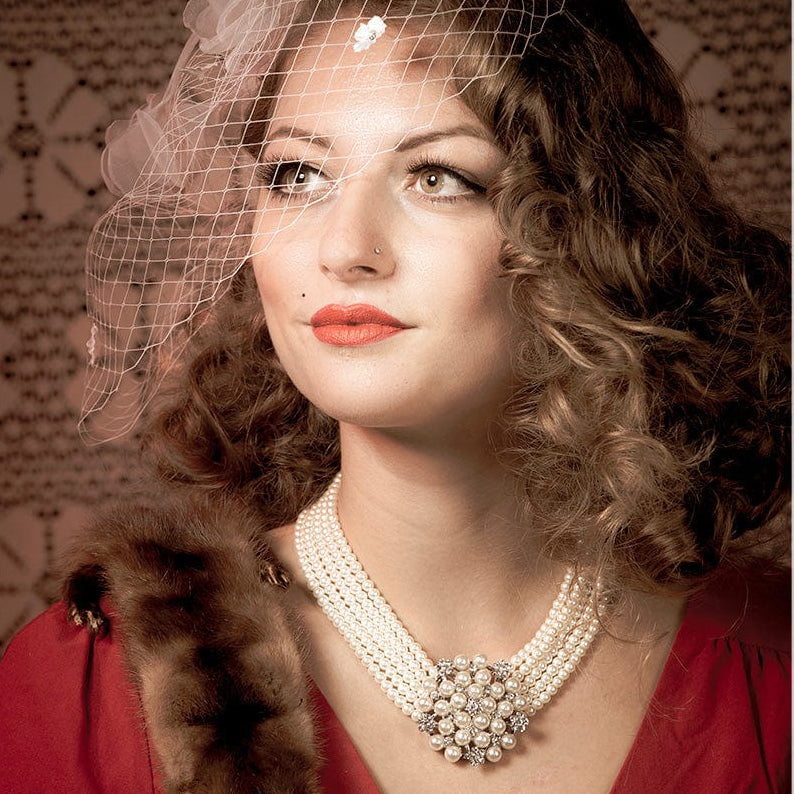 Vintage influencer Miss Peony Blossom wears our stunning Audrey Hepburn, Breakfast at Tiffanys inspired pearl choker.