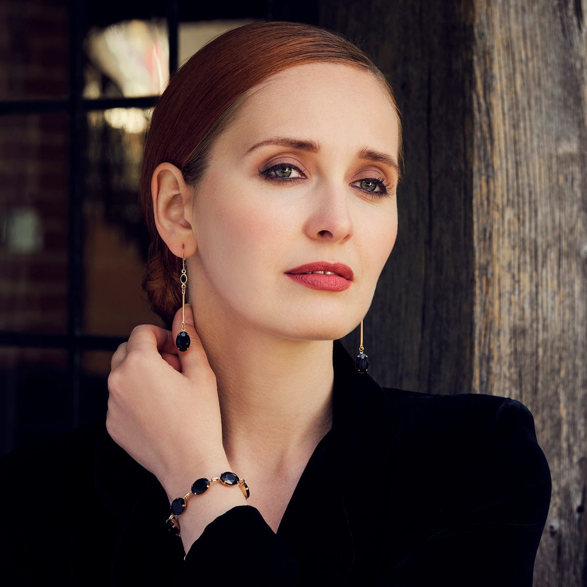Black-oval-stone-long-drop-gold-earrings